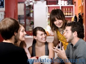 Five young friends in a coffee house